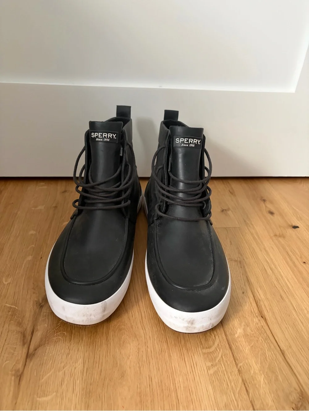 Sperry Black High-Top Boat Shoes with White Sole